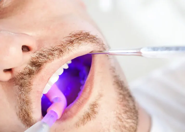 What does an oral cancer screening test detect?